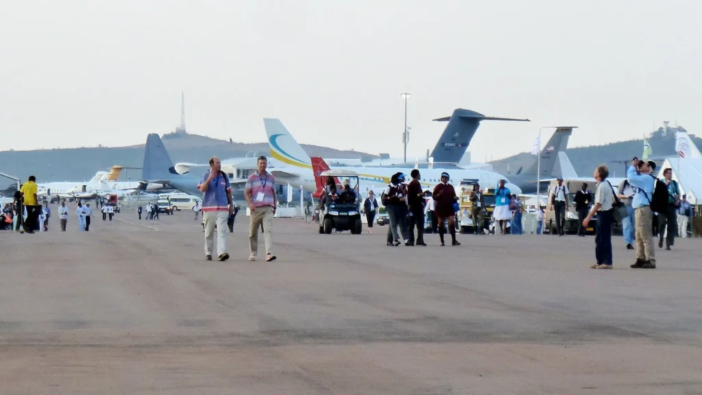 Trade visitors inspecting the outdoor aircraft exhibits at AAD.