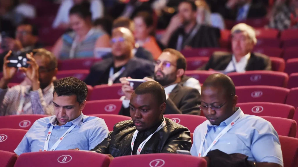 Attendees get ready for a presentation at Africa Tech Festival.