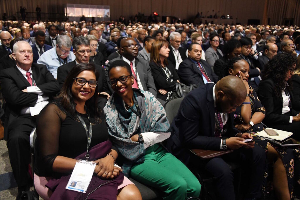 Large audience at a conference event at Sandton Convention Centre.