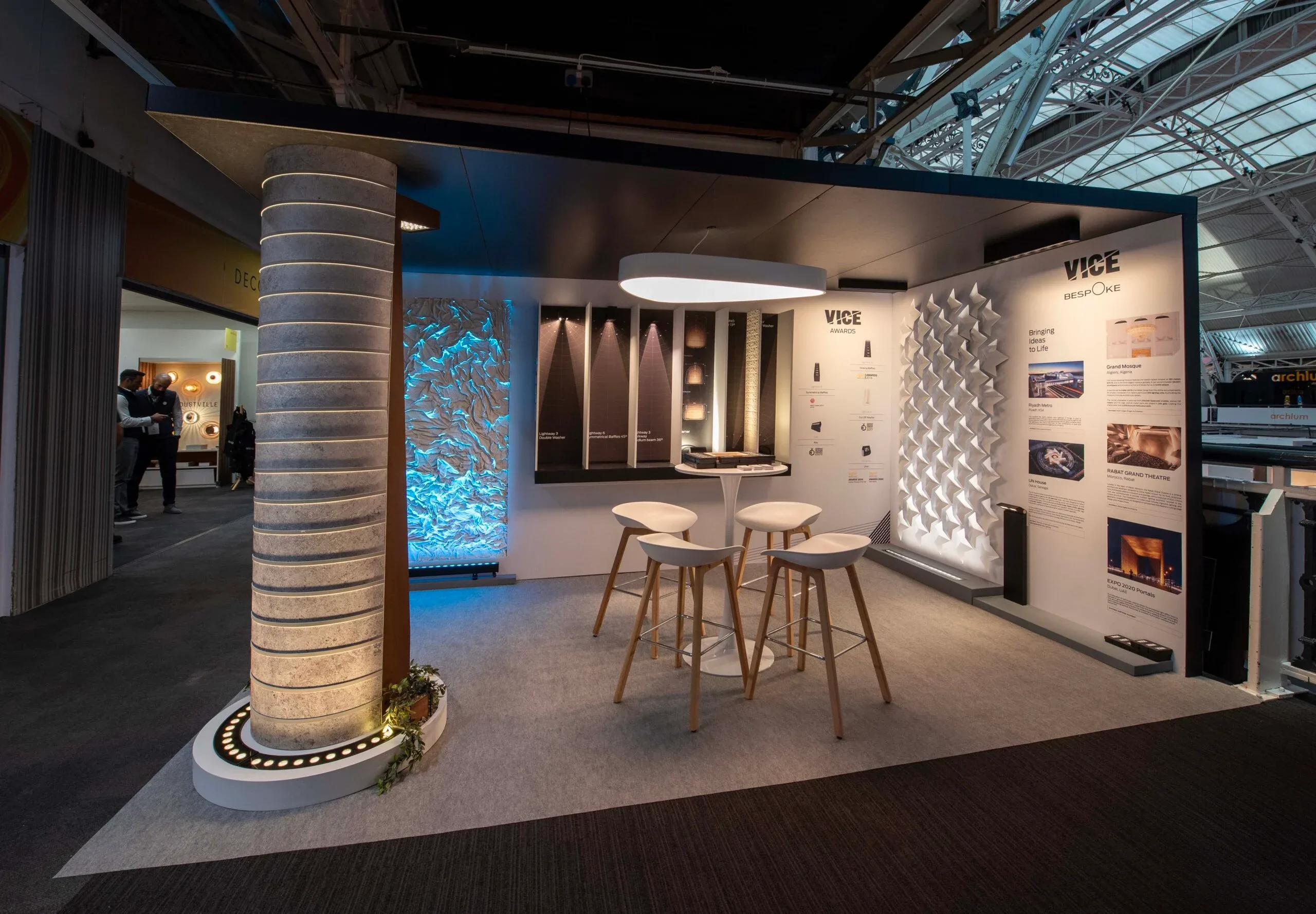 vice-lighting-exhibition-booth-builder-uk-stone-column-display.webp