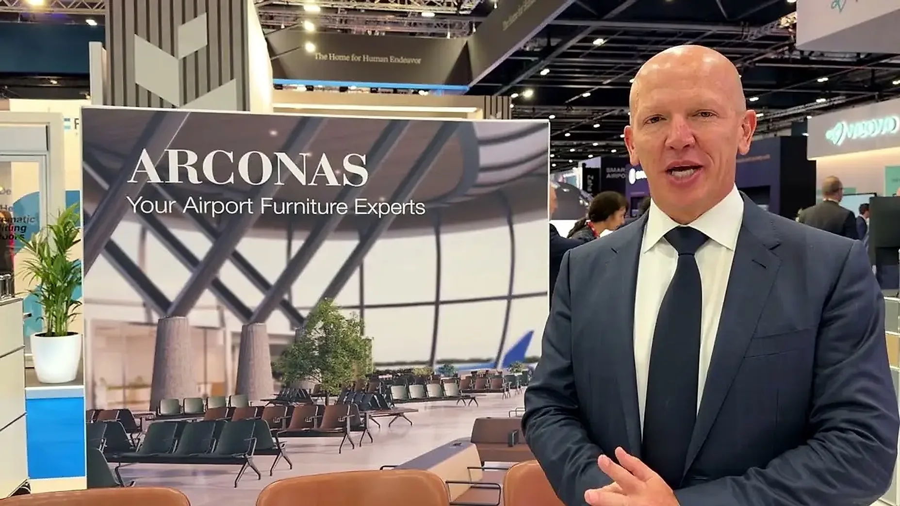 Pablo Reich of Arconas on their Booth Exhibits stand at Passenger Terminal Expo, London
