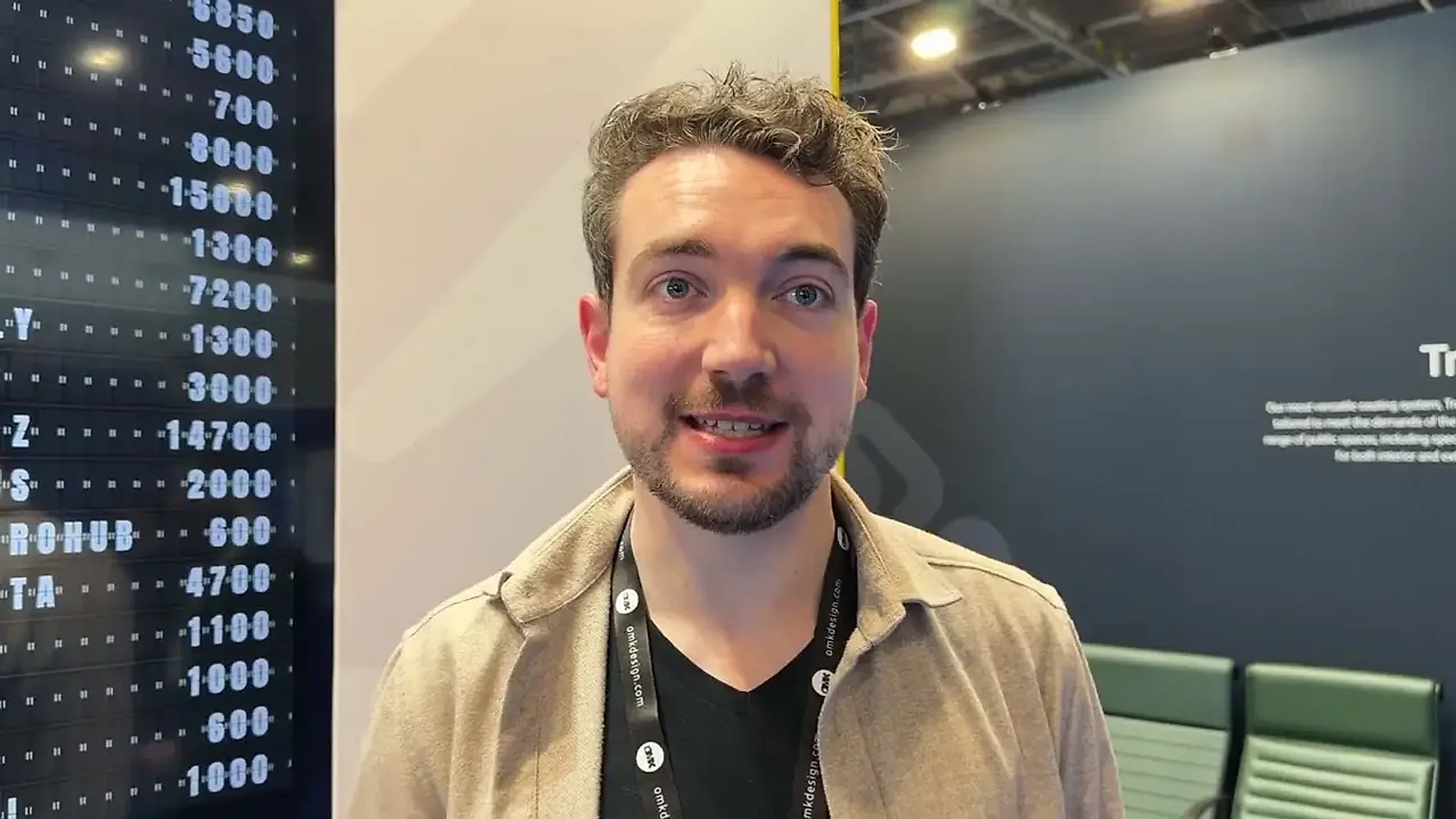 Alex of OMK Design on their Booth Exhibits stand at Passenger Terminal Expo, London