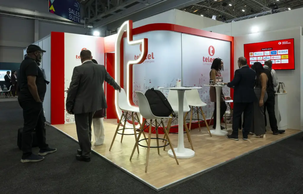Telecel's corner expo stand at AfricaCOM 2025, part of the 2025 Africa Tech Show, designed and built by Booth Exhibits™.