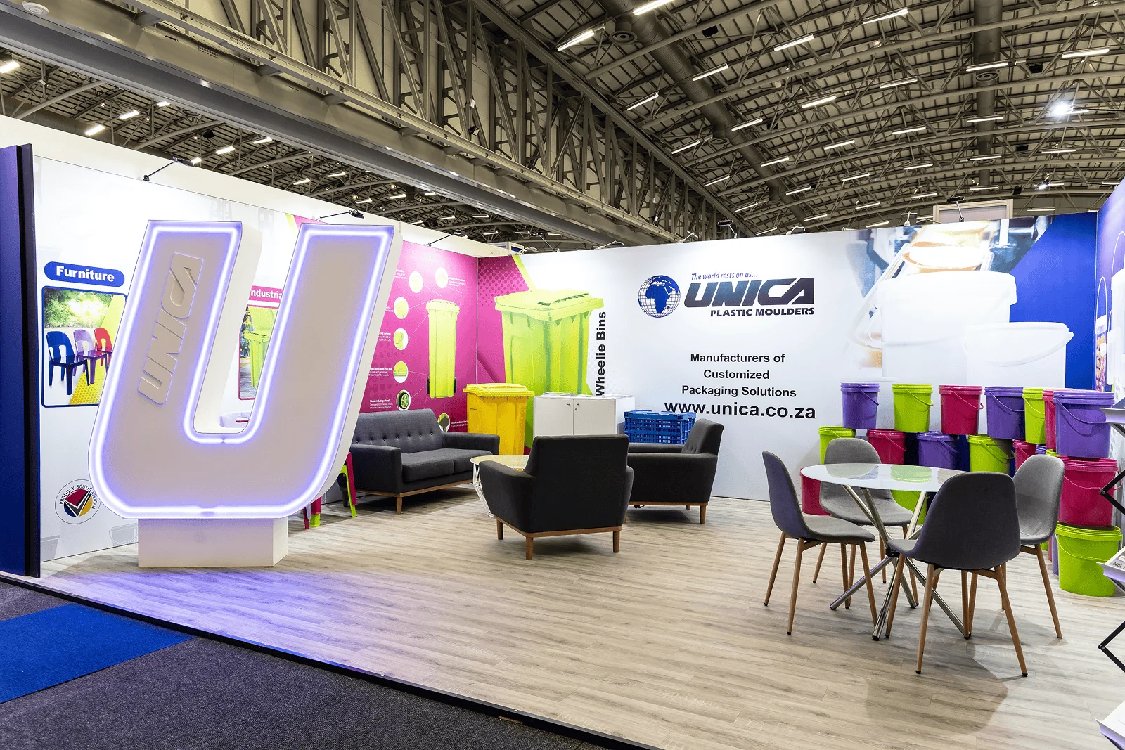 Unica exhibition stand with branded walls