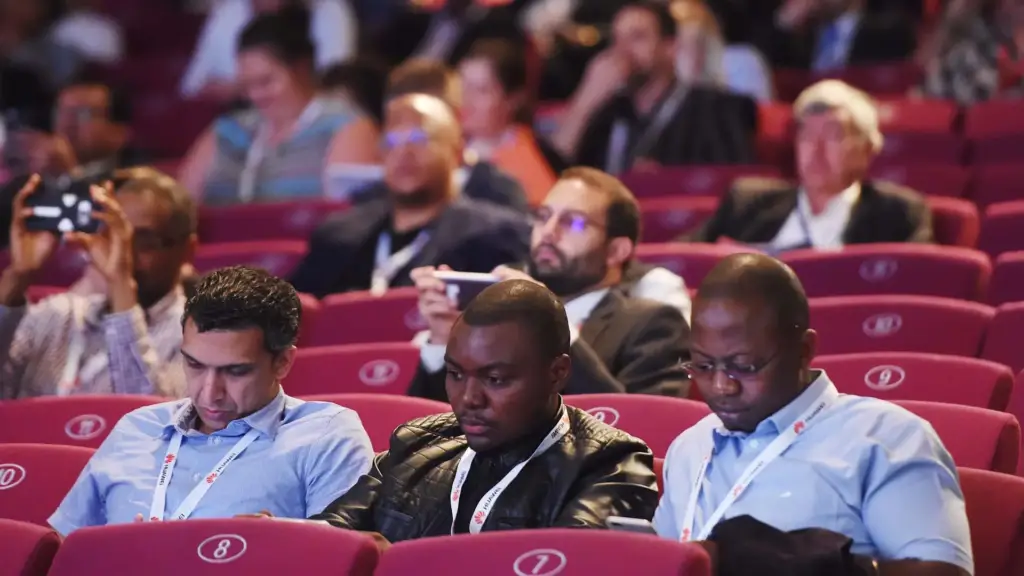 Attendees get ready for a presentation at Africa Tech Festival.