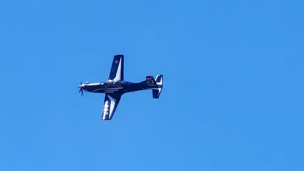A South African Air Force PC7 trainer of the Silver Falcons display team flying in the sky.